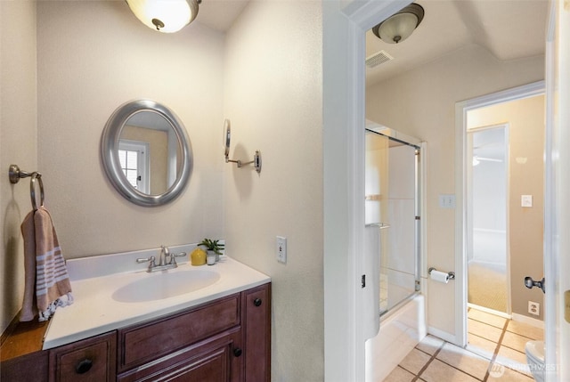 3851 Cliffside Dr, Bellingham, WA 98225 - bathroom with vanity, tile patterned floors, and enclosed tub / shower combo