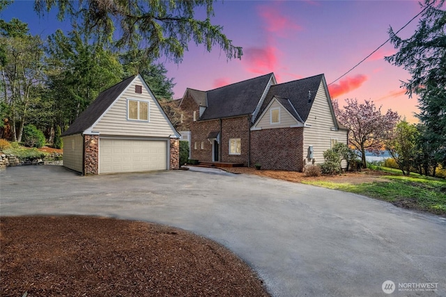 3851 Cliffside Dr, Bellingham, WA 98225 - view of front of property with an outdoor structure, driveway, and a garage