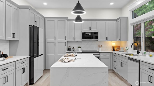 11832 158th Ave NE, Redmond, WA 98052 - kitchen featuring stainless steel appliances, backsplash, a center island, pendant lighting, and recessed lighting