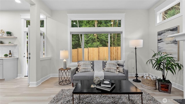 11832 158th Ave NE, Redmond, WA 98052 - living area featuring light wood-style floors and baseboards