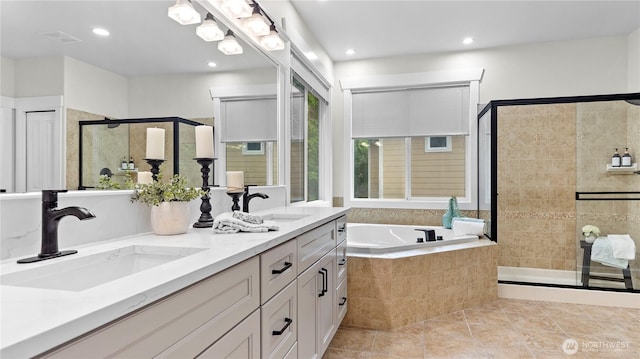 11832 158th Ave NE, Redmond, WA 98052 - bathroom featuring a stall shower, a garden tub, double vanity, tile patterned floors, and recessed lighting