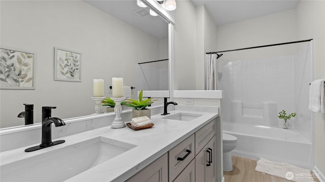 11832 158th Ave NE, Redmond, WA 98052 - full bathroom with double vanity, bathing tub / shower combination, and wood finished floors