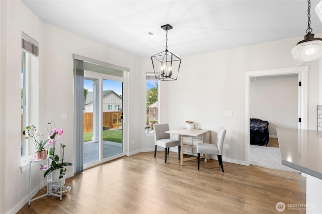 9386 Albert Way SE, Moses Lake, WA 98837 - living area with a chandelier and light wood finished floors