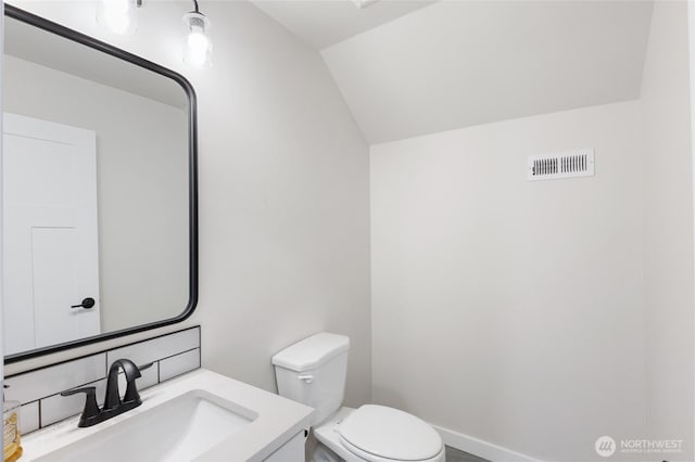 9386 Albert Way SE, Moses Lake, WA 98837 - bathroom featuring vanity and lofted ceiling