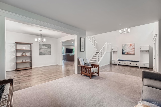 3592 SE 16th St, North Bend, WA 98045 - living area featuring a chandelier, wood finished floors, and stairway