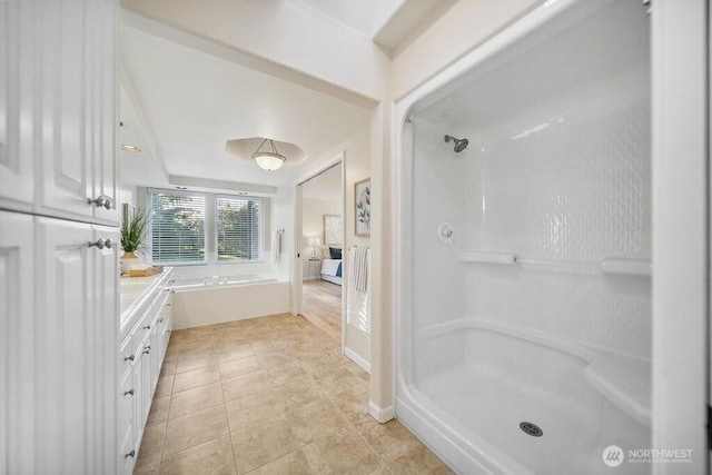 12 Jamestown Beach Ln, Sequim, WA 98382 - bathroom featuring vanity, tile patterned flooring, and a shower