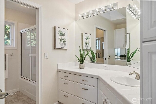 12 Jamestown Beach Ln, Sequim, WA 98382 - full bathroom with vanity and shower / bath combination with glass door