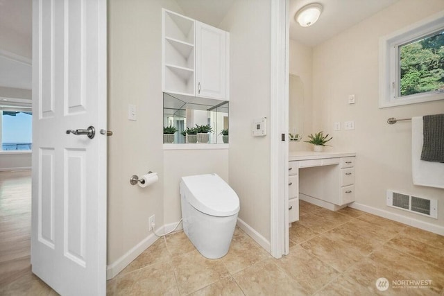 12 Jamestown Beach Ln, Sequim, WA 98382 - bathroom with vanity, healthy amount of natural light, and tile patterned flooring