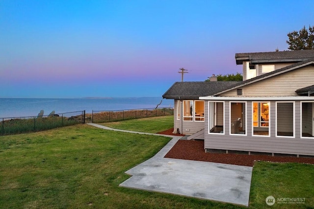 12 Jamestown Beach Ln, Sequim, WA 98382 - view of yard featuring a patio and a water view