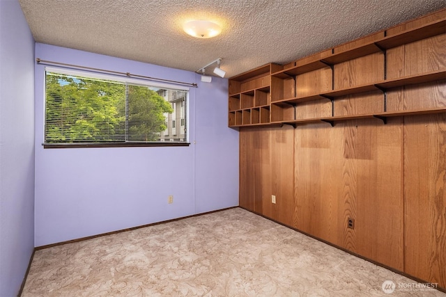 335 3rd Ave S Unit 203, Edmonds, WA 98020 - unfurnished bedroom with a textured ceiling and carpet floors