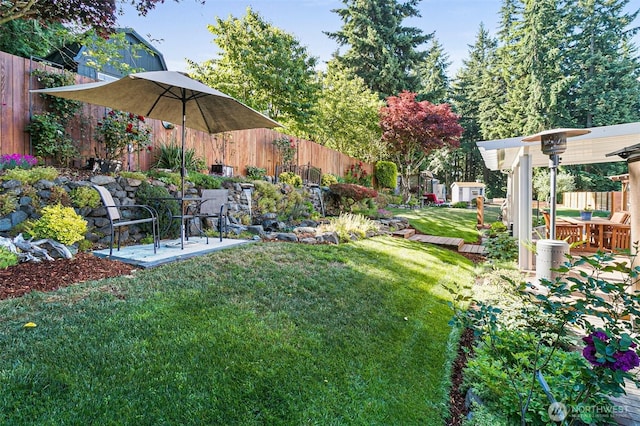 16508 39th Street Ct E, Lake Tapps, WA 98391 - fenced backyard featuring a storage unit