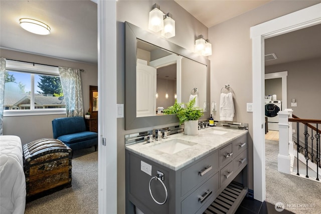 1132 121st St E, Tacoma, WA 98445 - ensuite bathroom featuring double vanity and washer / dryer