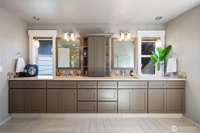 1132 121st St E, Tacoma, WA 98445 - full bath featuring double vanity and baseboards