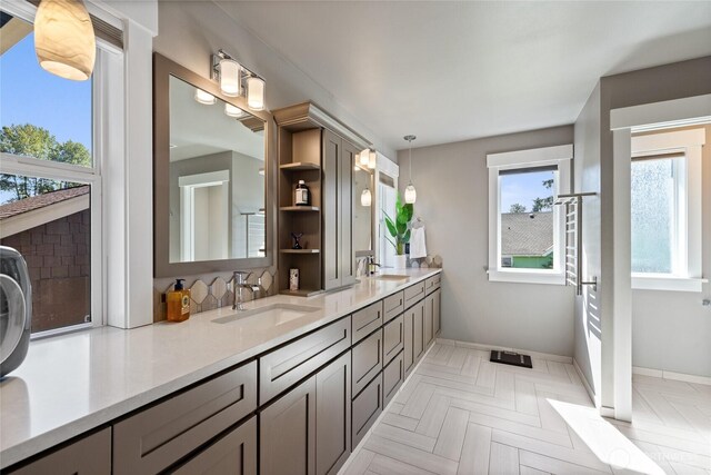 1132 121st St E, Tacoma, WA 98445 - full bath with double vanity and decorative backsplash
