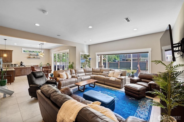 1132 121st St E, Tacoma, WA 98445 - living area featuring light tile patterned floors, recessed lighting, and a chandelier