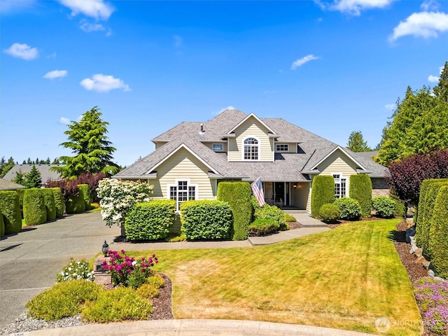 3819 Ridge Ct, Mount Vernon, WA 98274 - traditional home featuring a front lawn and roof with shingles