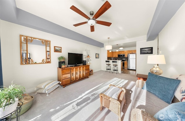 910 Harris Ave Unit 304, Bellingham, WA 98225 - living room featuring ceiling fan, light carpet, and lofted ceiling
