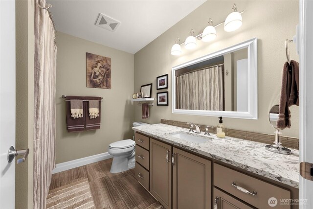 910 Harris Ave Unit 304, Bellingham, WA 98225 - full bath featuring wood finished floors and vanity