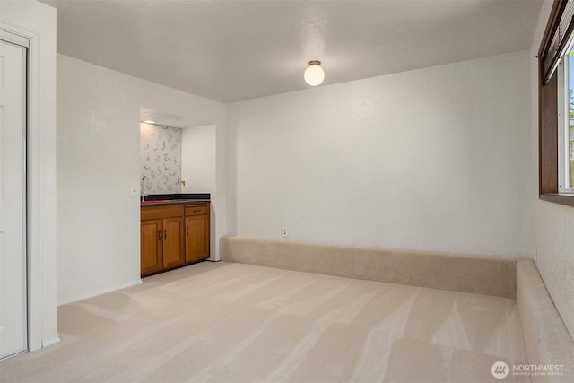 9119 185th Pl SW, Edmonds, WA 98026 - unfurnished dining area featuring light carpet