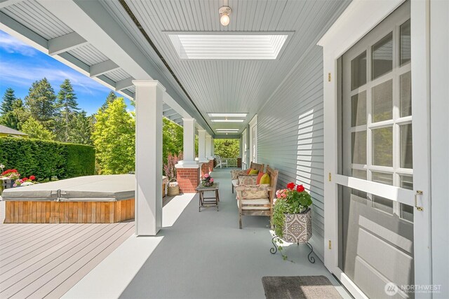 1800 Dakin St, Bellingham, WA 98229 - covered porch featuring a covered hot tub