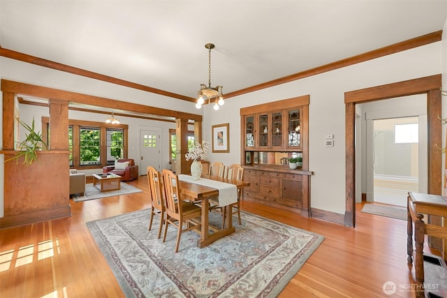 1800 Dakin St, Bellingham, WA 98229 - dining area featuring a chandelier, light wood-style flooring, and ornamental molding