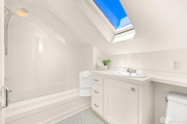 1800 Dakin St, Bellingham, WA 98229 - full bath featuring a skylight, bathing tub / shower combination, tile patterned flooring, and vanity
