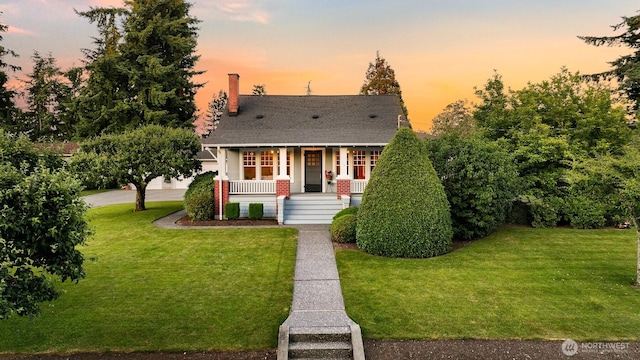 1800 Dakin St, Bellingham, WA 98229 - view of front of property featuring a porch, a lawn, and a shingled roof