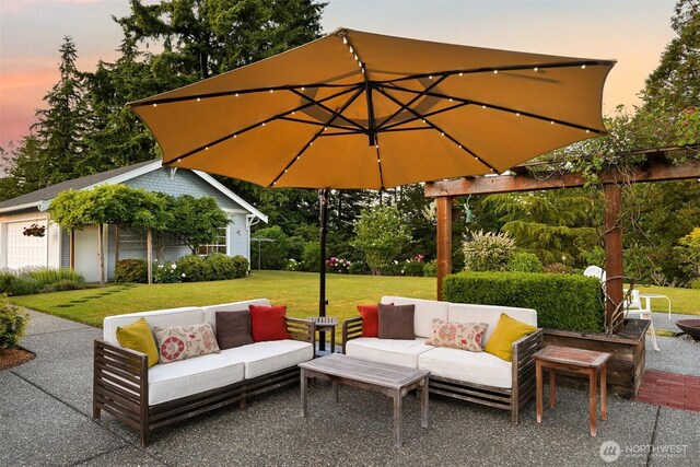 1800 Dakin St, Bellingham, WA 98229 - patio terrace at dusk featuring an outdoor hangout area, a yard, a patio, and an outbuilding