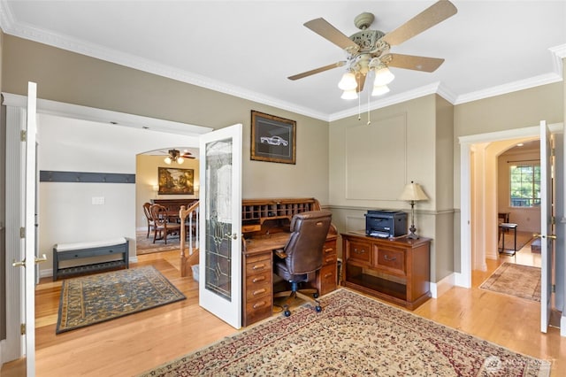 7322 NE Blue Goose Rd, Moses Lake, WA 98837 - office area featuring ceiling fan, wood finished floors, ornamental molding, and arched walkways