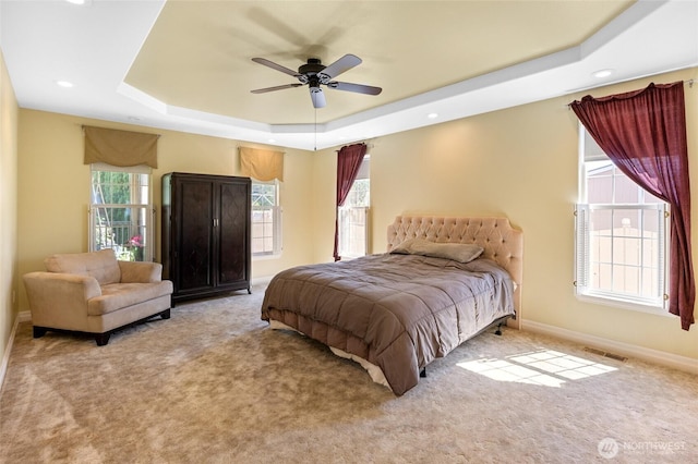 7322 NE Blue Goose Rd, Moses Lake, WA 98837 - bedroom with a raised ceiling, carpet flooring, recessed lighting, and ceiling fan
