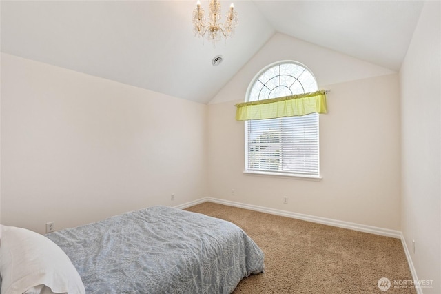 7322 NE Blue Goose Rd, Moses Lake, WA 98837 - carpeted bedroom featuring vaulted ceiling and a chandelier