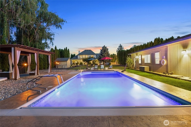 7322 NE Blue Goose Rd, Moses Lake, WA 98837 - outdoor pool with a patio area and an outdoor structure