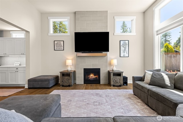 8704 188th St SW, Edmonds, WA 98026 - living area with wood finished floors and a tile fireplace