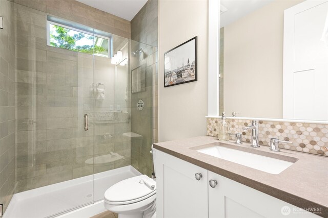 8704 188th St SW, Edmonds, WA 98026 - bathroom featuring vanity, a stall shower, and backsplash