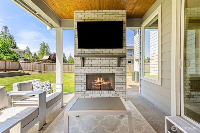 8704 188th St SW, Edmonds, WA 98026 - fenced backyard with a patio and an outdoor living space with a fireplace