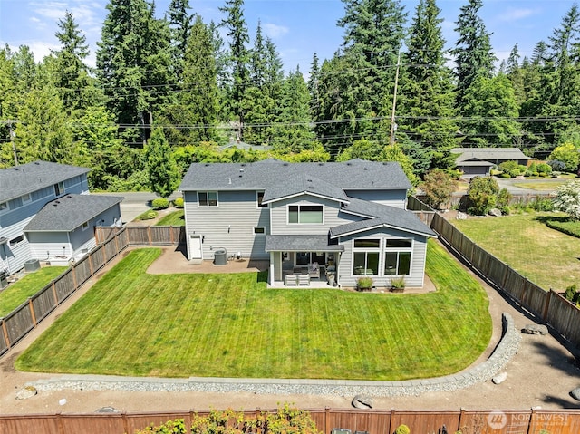 8704 188th St SW, Edmonds, WA 98026 - rear view of house featuring a patio area, a fenced backyard, and roof with shingles