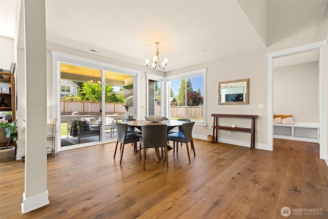 8704 188th St SW, Edmonds, WA 98026 - dining room with a chandelier and wood-type flooring