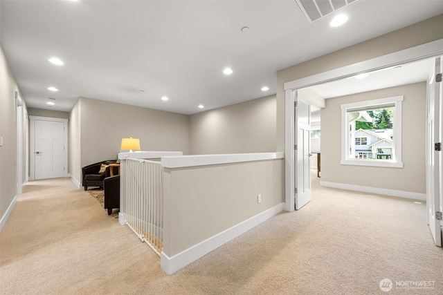 8704 188th St SW, Edmonds, WA 98026 - hallway featuring light colored carpet, recessed lighting, and an upstairs landing