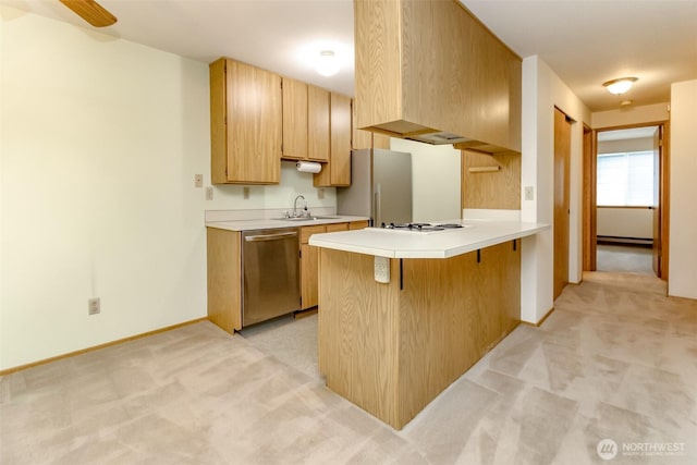 25735 115th St SE Unit B102, Kent, WA 98030 - kitchen with appliances with stainless steel finishes, light colored carpet, a peninsula, and light countertops