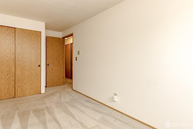 25735 115th St SE Unit B102, Kent, WA 98030 - unfurnished bedroom featuring carpet flooring and a closet