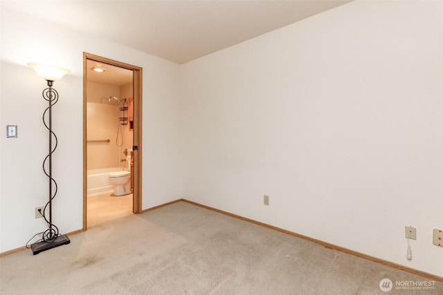25735 115th St SE Unit B102, Kent, WA 98030 - empty room featuring light carpet and baseboards