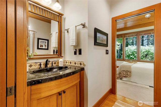 36915 NE 98th St, Carnation, WA 98014 - bathroom with wood finished floors, vanity, and a shower