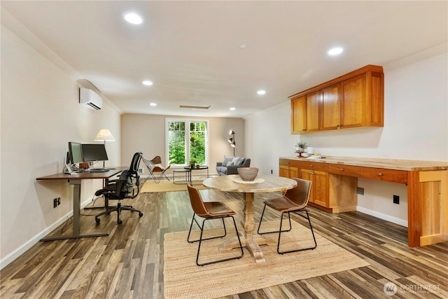 36915 NE 98th St, Carnation, WA 98014 - dining room featuring a wall mounted air conditioner, a desk, dark wood-style flooring, and recessed lighting