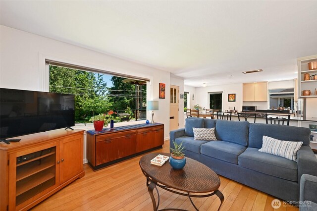 9539 49th Ave NE, Seattle, WA 98115 - living room featuring light wood-style floors