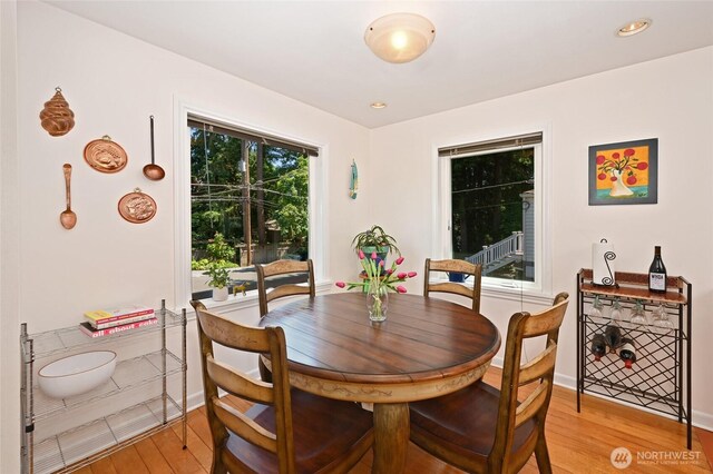 9539 49th Ave NE, Seattle, WA 98115 - dining room featuring light wood-style flooring and baseboards