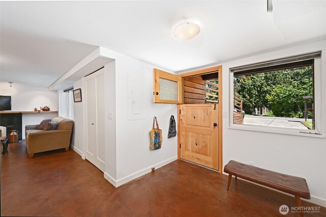 9539 49th Ave NE, Seattle, WA 98115 - entrance foyer featuring finished concrete flooring and electric panel
