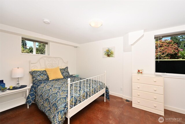 9539 49th Ave NE, Seattle, WA 98115 - bedroom with multiple windows and concrete floors