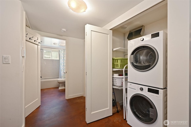 9539 49th Ave NE, Seattle, WA 98115 - laundry area with stacked washer / dryer and baseboards