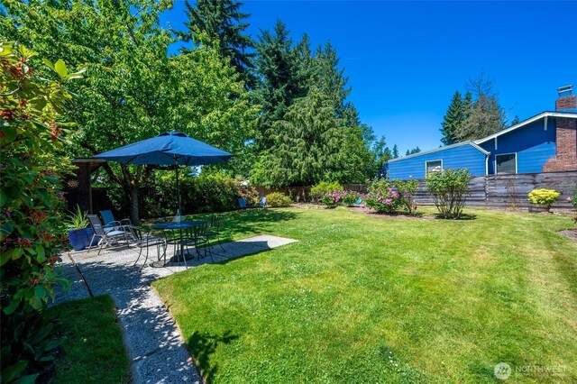 9539 49th Ave NE, Seattle, WA 98115 - fenced backyard with a patio area