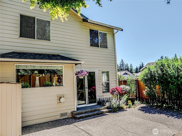 18808 19th Dr SE, Bothell, WA 98012 - back of house featuring entry steps, a patio area, and a shingled roof